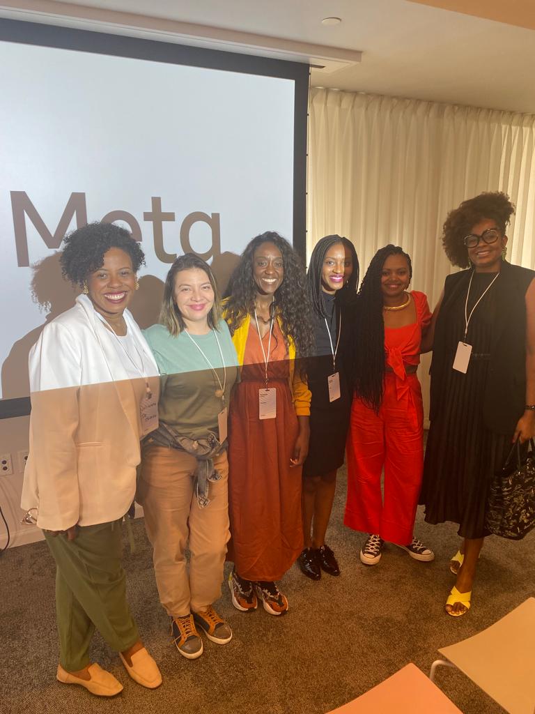 Brazilian women building connections at a Meta event